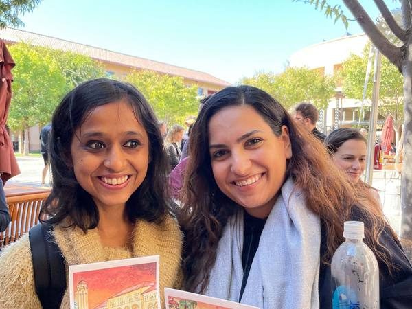 Friends with their hand-painted campus cards.